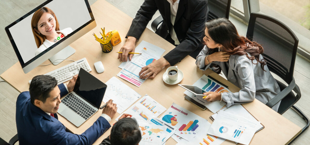 Video call group business people meeting on virtual workplace or remote office. Telework conference call using smart video technology to communicate colleague in professional corporate business.